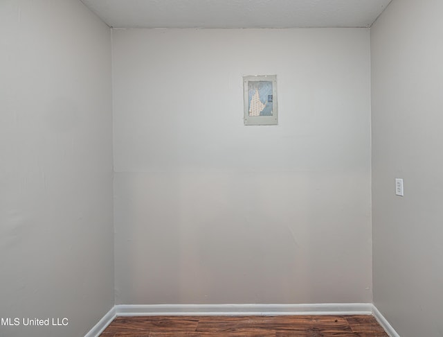 27 Wisteria Ct, Jackson, MS 39204 - washroom with dark wood-type flooring and baseboards