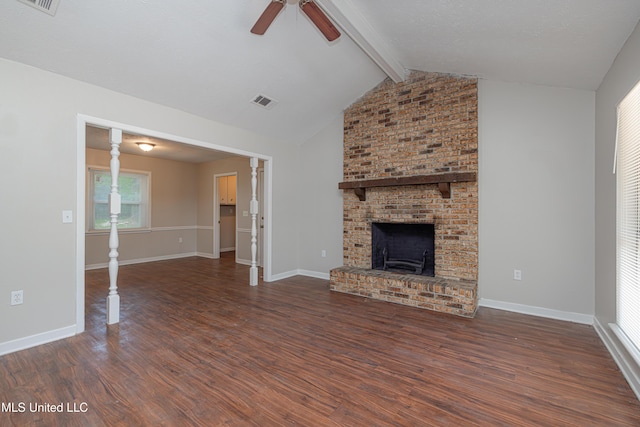 27 Wisteria Ct, Jackson, MS 39204 - unfurnished living room with ceiling fan, wood finished floors, a fireplace, and baseboards