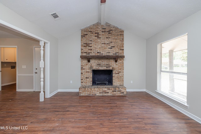 27 Wisteria Ct, Jackson, MS 39204 - unfurnished living room featuring wood finished floors, a brick fireplace, and baseboards