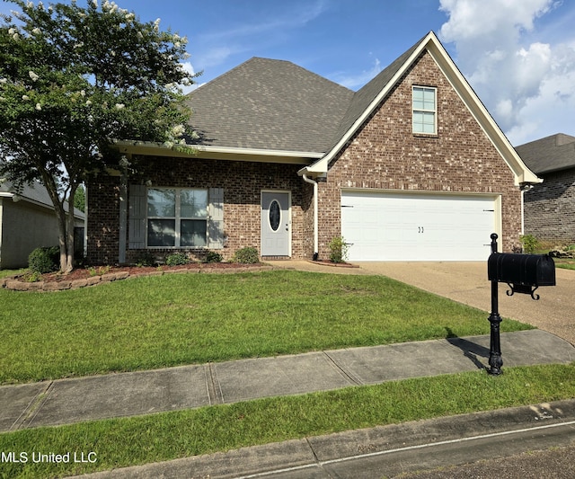 305 Flagstone Dr, Brandon, MS 39042 - view of front of property featuring brick siding, driveway, a front yard, a garage, and a shingled roof