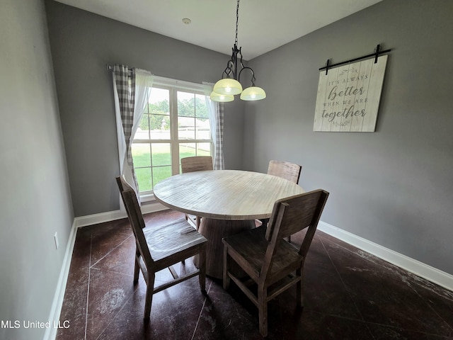 305 Flagstone Dr, Brandon, MS 39042 - dining space with baseboards and a barn door