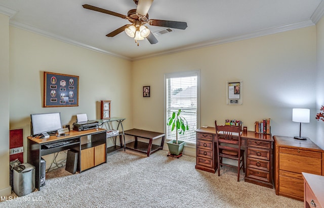 home office featuring light carpet, ornamental molding, visible vents, and a ceiling fan