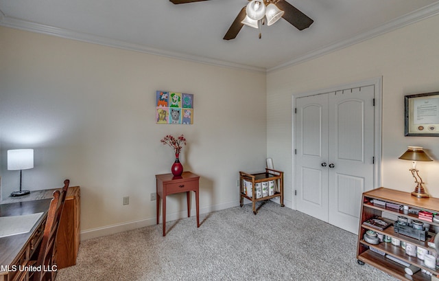 interior space with carpet floors, crown molding, baseboards, and a ceiling fan