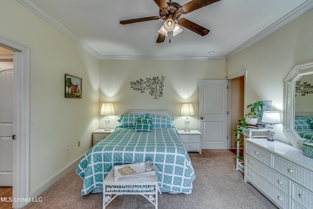 carpeted bedroom featuring crown molding, baseboards, and ceiling fan