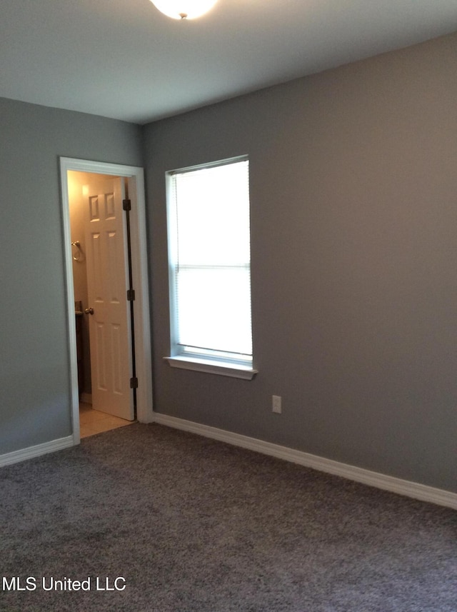 view of carpeted spare room