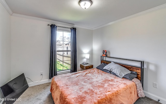 bedroom featuring baseboards, multiple windows, carpet, and ornamental molding