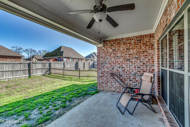 view of patio / terrace featuring a fenced backyard and ceiling fan