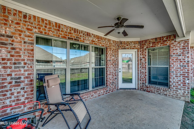 view of patio featuring ceiling fan