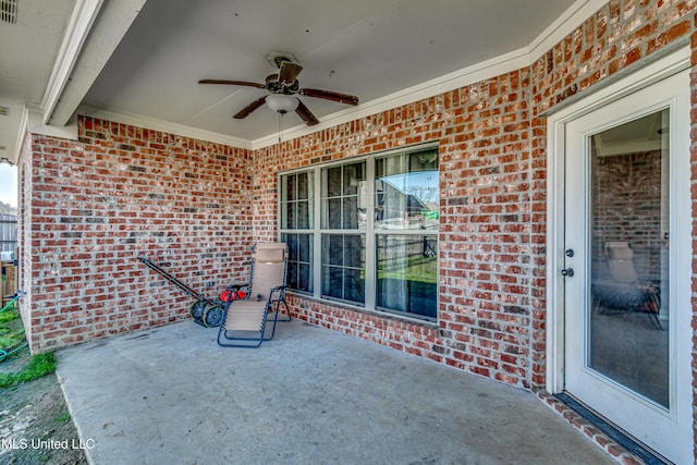 view of patio featuring ceiling fan