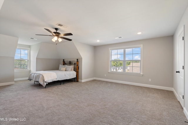 bedroom with light colored carpet and ceiling fan