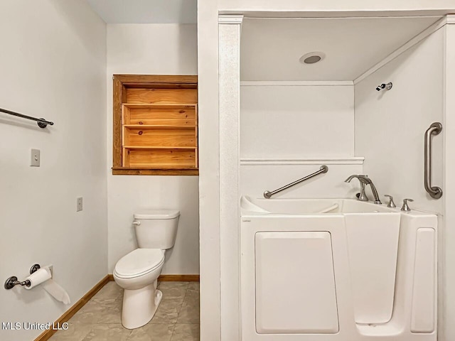 159 Vard Sullivan Rd, Pinola, MS 39149 - full bathroom featuring washer / dryer, toilet, baseboards, tile patterned floors, and a bath