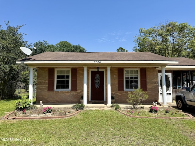 2006 Eden St, Pascagoula, MS 39581 - single story home with a porch, brick siding, and a shingled roof