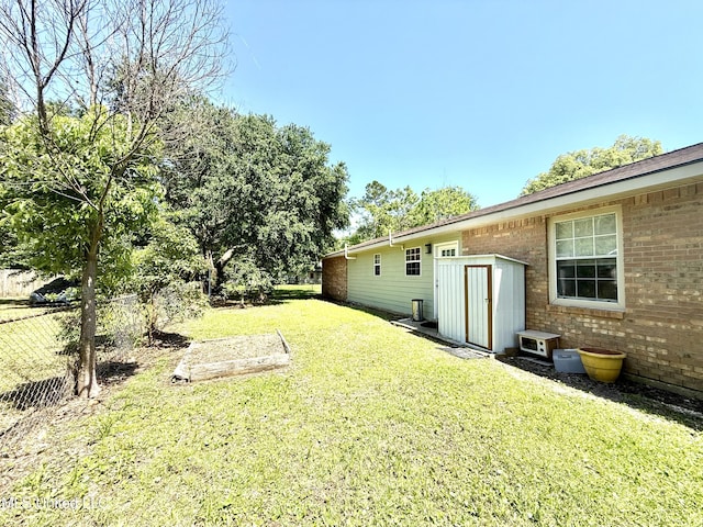 2006 Eden St, Pascagoula, MS 39581 - view of yard with a storage shed and an outbuilding