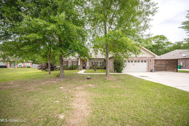 view of property hidden behind natural elements with fence, a front lawn, concrete driveway, brick siding, and a garage