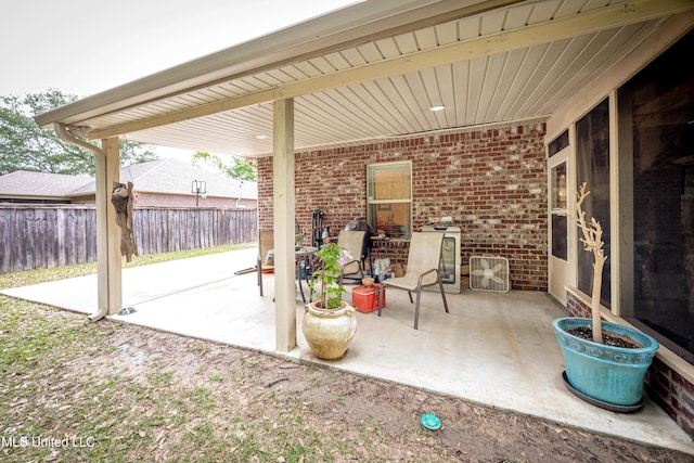 view of patio / terrace with fence