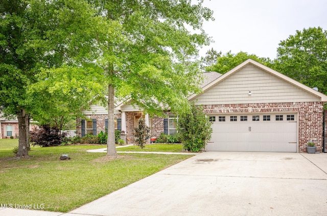 view of front facade with brick siding, an attached garage, driveway, and a front yard