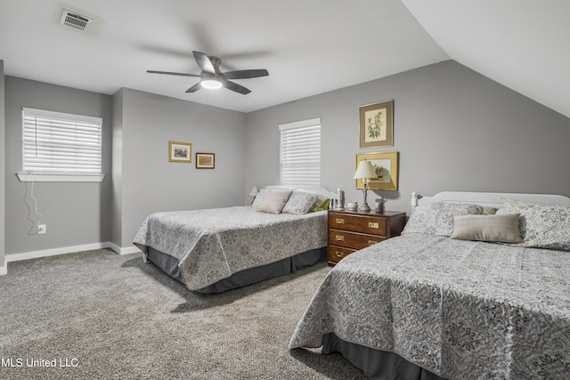 carpeted bedroom featuring vaulted ceiling and ceiling fan