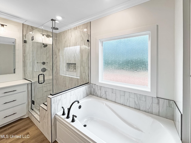 949 Mullican Rd, Florence, MS 39073 - full bath with a bath, a shower stall, ornamental molding, vanity, and wood finished floors