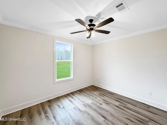 949 Mullican Rd, Florence, MS 39073 - spare room with ornamental molding, wood finished floors, baseboards, and ceiling fan