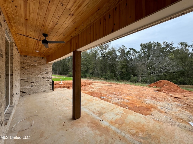 view of patio featuring ceiling fan