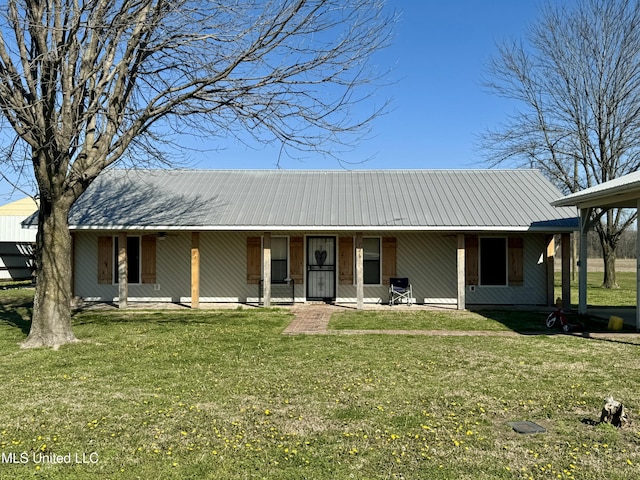 126 Interstate Rd, Shaw, MS 38773 - view of front of home with a front lawn, metal roof, and covered porch