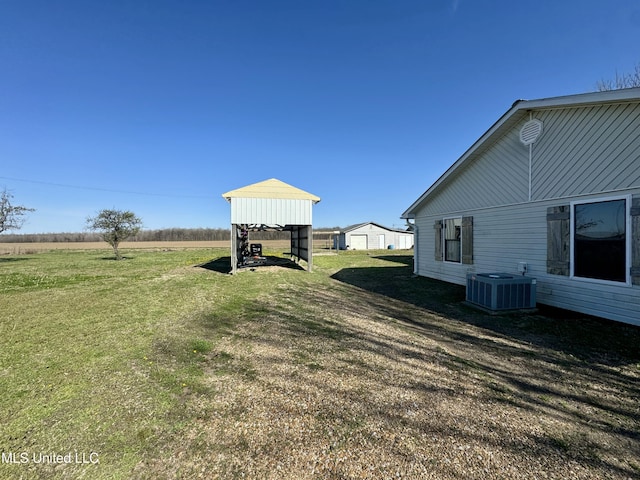 126 Interstate Rd, Shaw, MS 38773 - view of yard featuring central AC unit