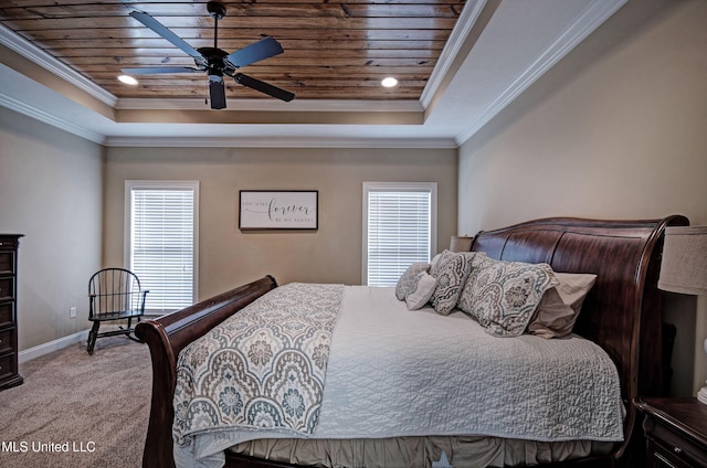 bedroom featuring wood ceiling, a tray ceiling, and carpet floors