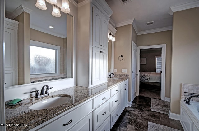 ensuite bathroom featuring a garden tub, visible vents, double vanity, a sink, and crown molding