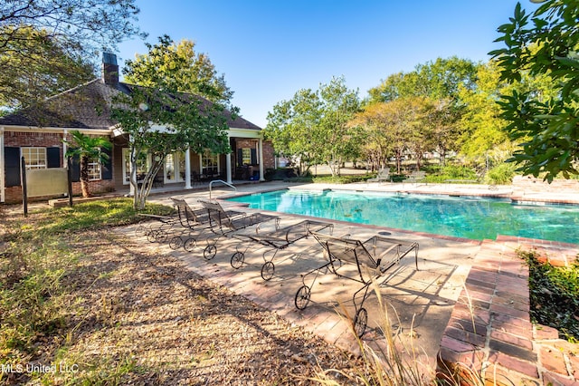 pool featuring a patio