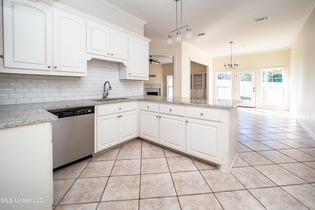 kitchen featuring visible vents, a sink, a peninsula, light tile patterned flooring, and dishwasher