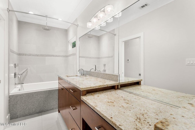 1309 Bowen Ave, Ocean Springs, MS 39564 - full bath with vanity, a combined bath / shower with rainfall shower, and tile patterned flooring