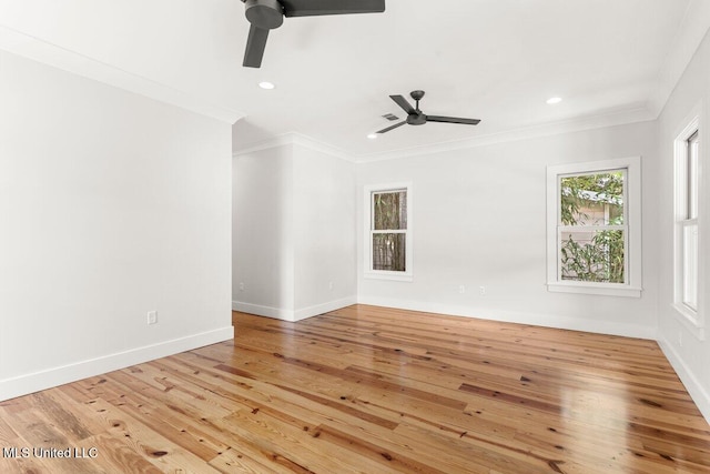 1309 Bowen Ave, Ocean Springs, MS 39564 - empty room with a ceiling fan, crown molding, wood-type flooring, recessed lighting, and baseboards