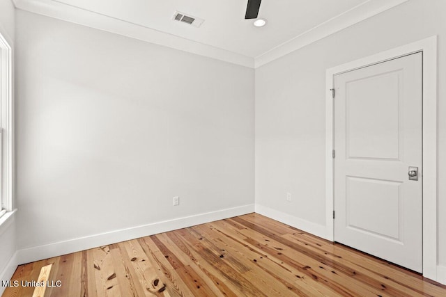 1309 Bowen Ave, Ocean Springs, MS 39564 - unfurnished room with baseboards, light wood-type flooring, recessed lighting, a ceiling fan, and crown molding