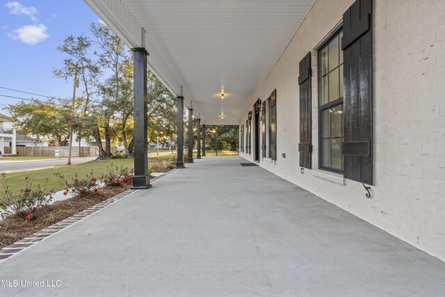 view of patio featuring a porch