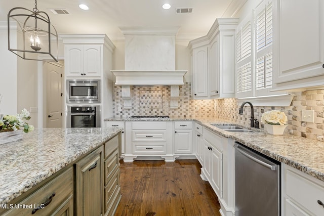 117 Belle Ct, Madison, MS 39110 - kitchen featuring stainless steel appliances, light stone counters, white cabinets, and recessed lighting