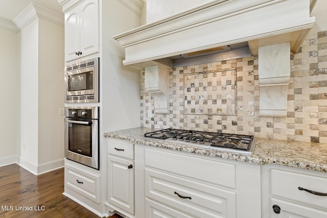 117 Belle Ct, Madison, MS 39110 - kitchen with appliances with stainless steel finishes, premium range hood, decorative backsplash, ornamental molding, and dark wood-style floors