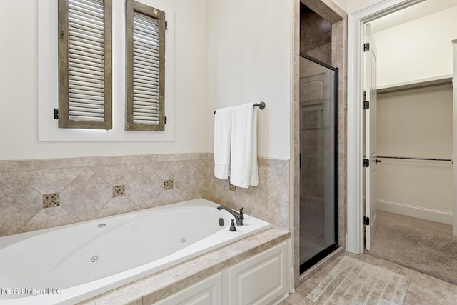 117 Belle Ct, Madison, MS 39110 - bathroom with a stall shower, a jetted tub, and tile patterned flooring