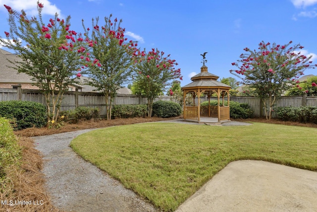 117 Belle Ct, Madison, MS 39110 - fenced backyard with a gazebo and a patio area