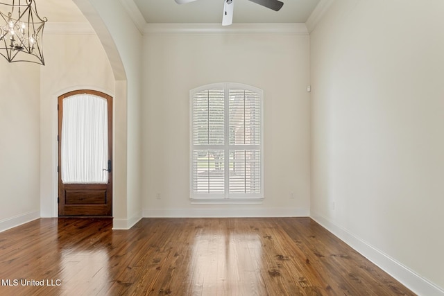 117 Belle Ct, Madison, MS 39110 - foyer entrance with arched walkways, ornamental molding, hardwood / wood-style flooring, ceiling fan, and a chandelier