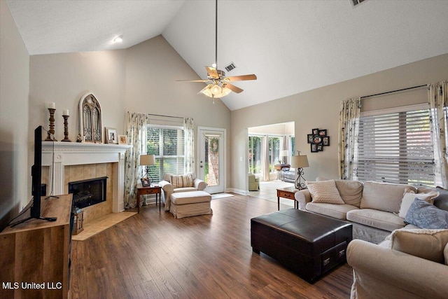 1510 Independence Blvd, Flowood, MS 39232 - living room featuring high vaulted ceiling, wood finished floors, a ceiling fan, and a fireplace