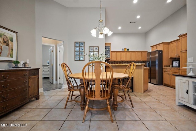 1510 Independence Blvd, Flowood, MS 39232 - dining room featuring a high ceiling, a chandelier, light tile patterned floors, and recessed lighting