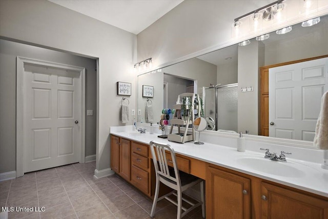 1510 Independence Blvd, Flowood, MS 39232 - full bathroom featuring double vanity, tile patterned floors, a stall shower, and baseboards