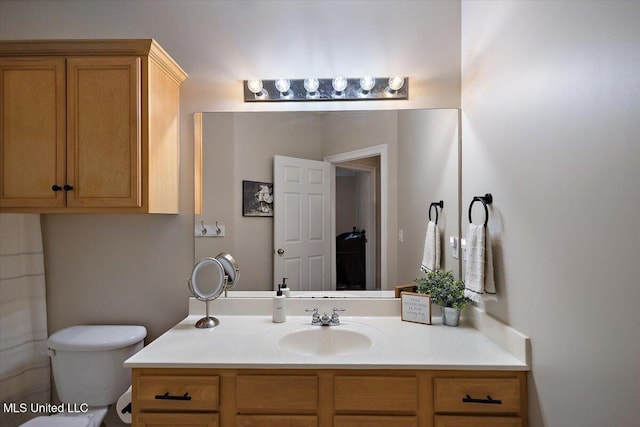 1510 Independence Blvd, Flowood, MS 39232 - bathroom featuring vanity and toilet