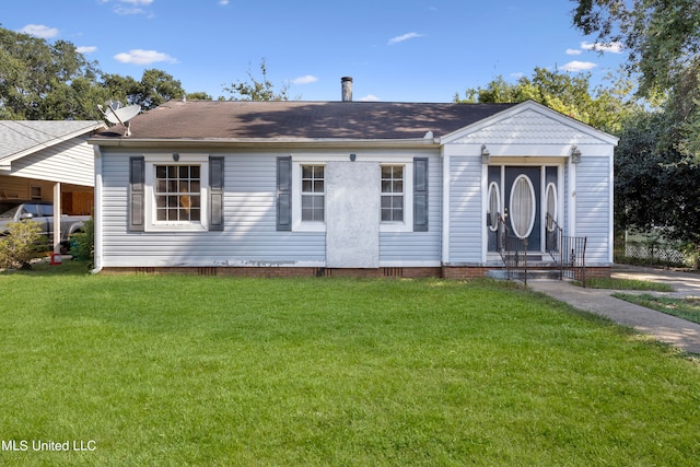 view of front facade with a front lawn