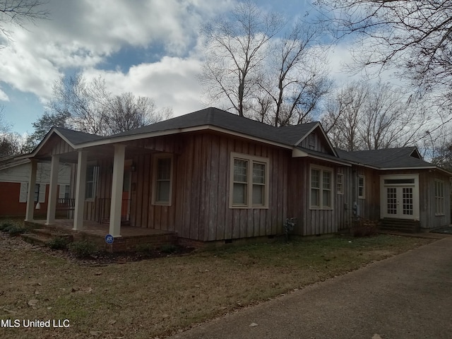 103 Park Ave, Indianola, MS 38751 - view of property exterior with a porch and a yard