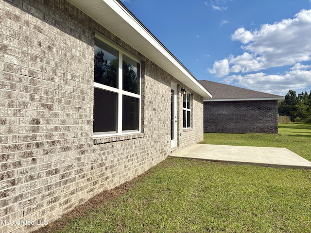 18071 Tiffany Renee Dr, Gulfport, MS 39503 - view of green lawn with a patio