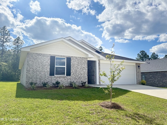 18071 Tiffany Renee Dr, Gulfport, MS 39503 - single story home featuring brick siding, driveway, an attached garage, and a front lawn