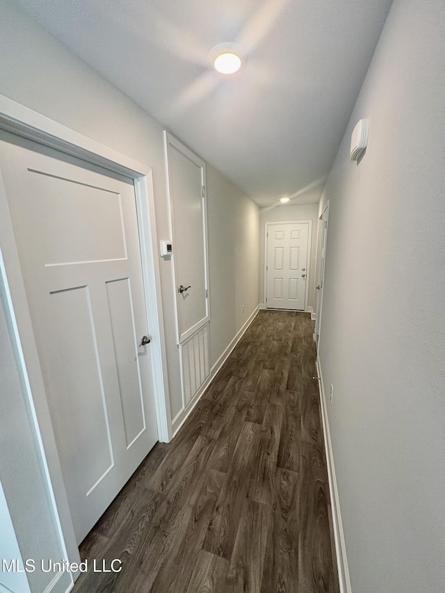 18071 Tiffany Renee Dr, Gulfport, MS 39503 - hall featuring dark wood finished floors and baseboards