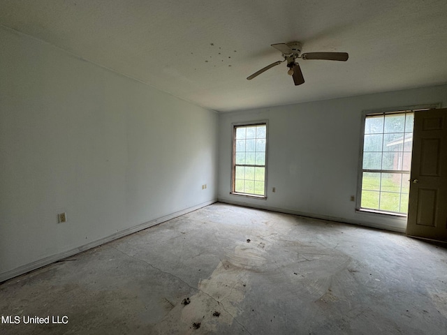 spare room featuring ceiling fan