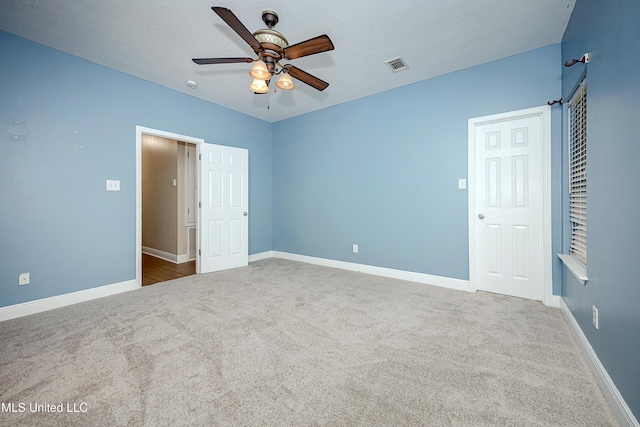 8002 Martin Bluff Rd, Gautier, MS 39553 - unfurnished bedroom with carpet and a ceiling fan